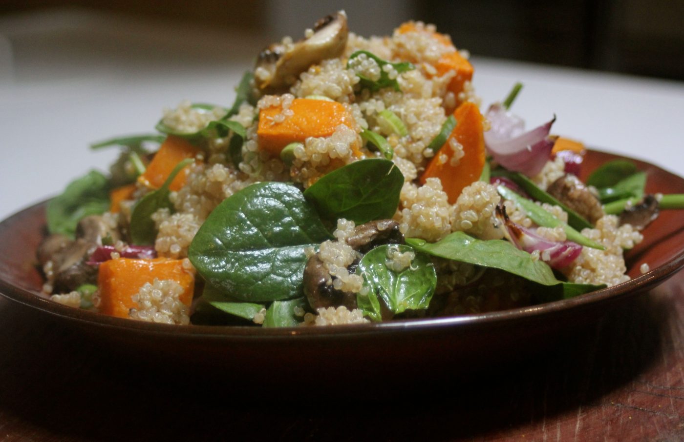 , Healthy salad with quinoa, roasted pumpkin and forest mushrooms