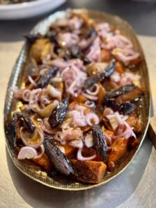 Beautiful Spice-Roasted Sweet Potato Salad with Goat's Cheese, Dates and Pickled Shallots