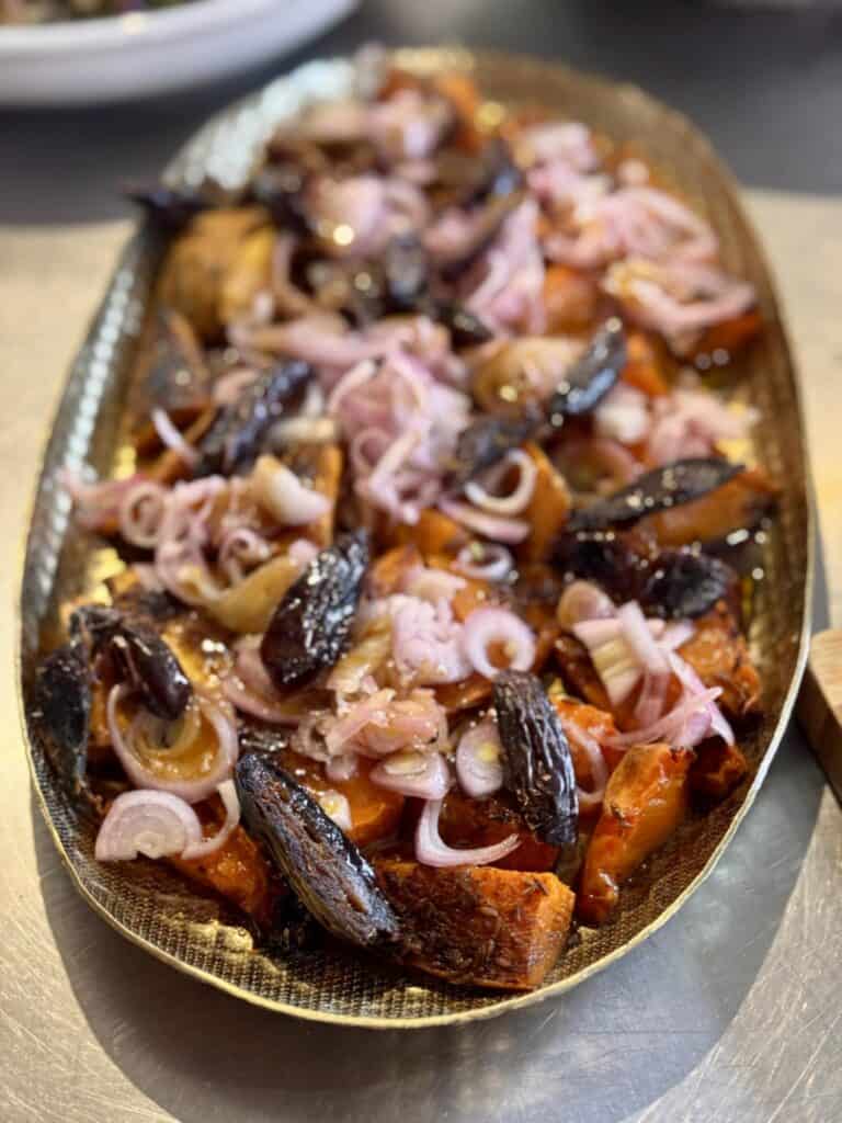 Beautiful Spice-Roasted Sweet Potato Salad with Goat's Cheese, Dates and Pickled Shallots