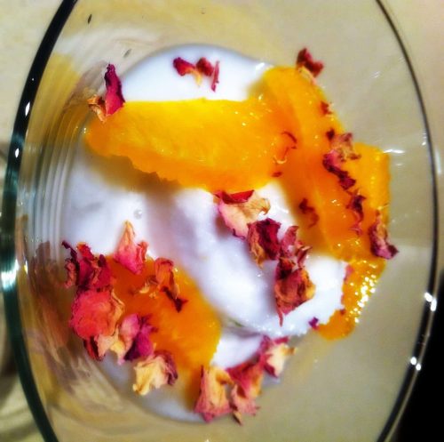 Coconut sorbet with oranges in syrup