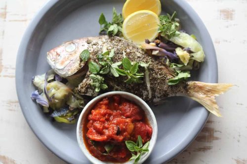 Whole baked snapper with Italian pepperonata